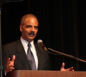 Eric Holder at lectern